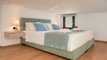 Suite, Balcony, Garden View | In-room safe, iron/ironing board, free WiFi