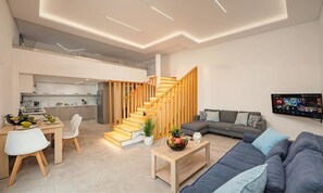 Suite, balcon, vue sur le jardin | Aire de séjour