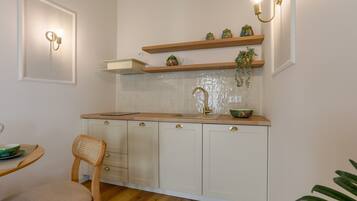 Fridge, microwave, stovetop, coffee/tea maker