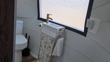 Shower, towels, soap, shampoo