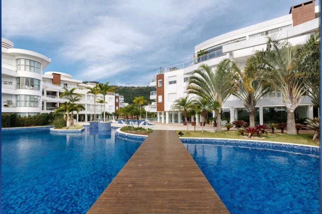 Indoor pool, 6 outdoor pools, open 8:00 AM to 10:00 PM, pool umbrellas