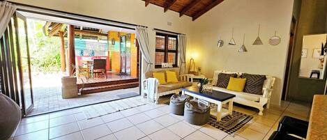 Apartment, 3 Bedrooms, Patio | Living area | Books