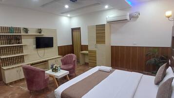 Superior Suite, 1 Bedroom | Iron/ironing board, free WiFi