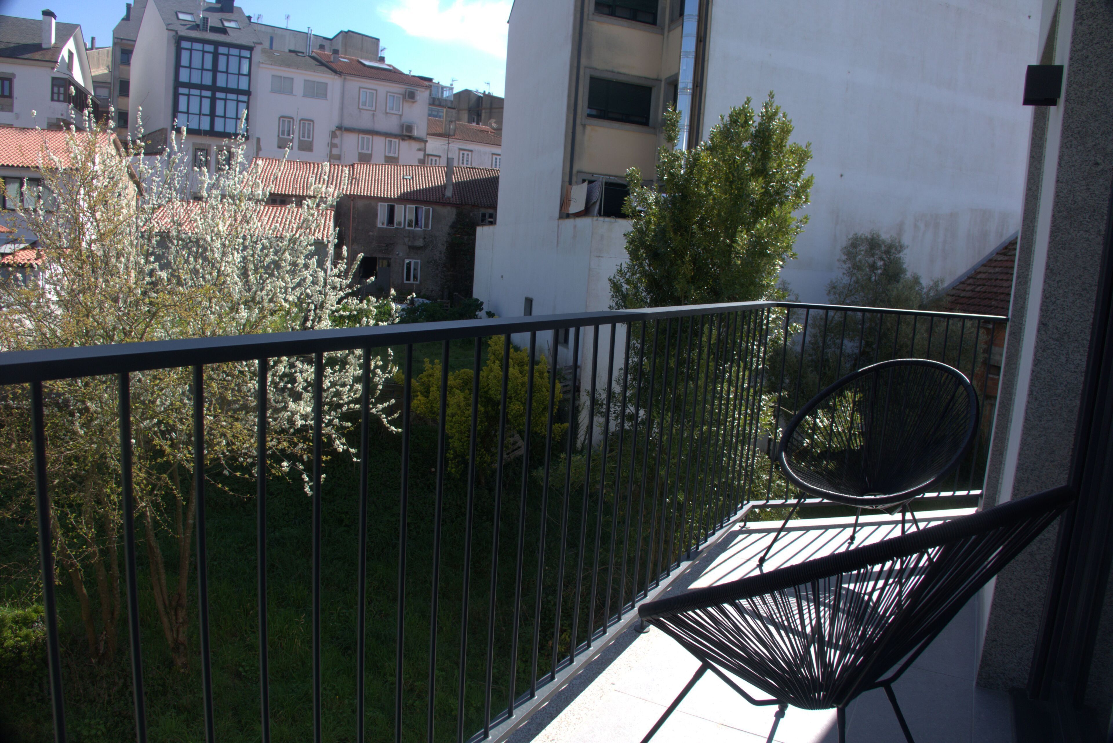 Apartamento, balcón | Jardines del alojamiento