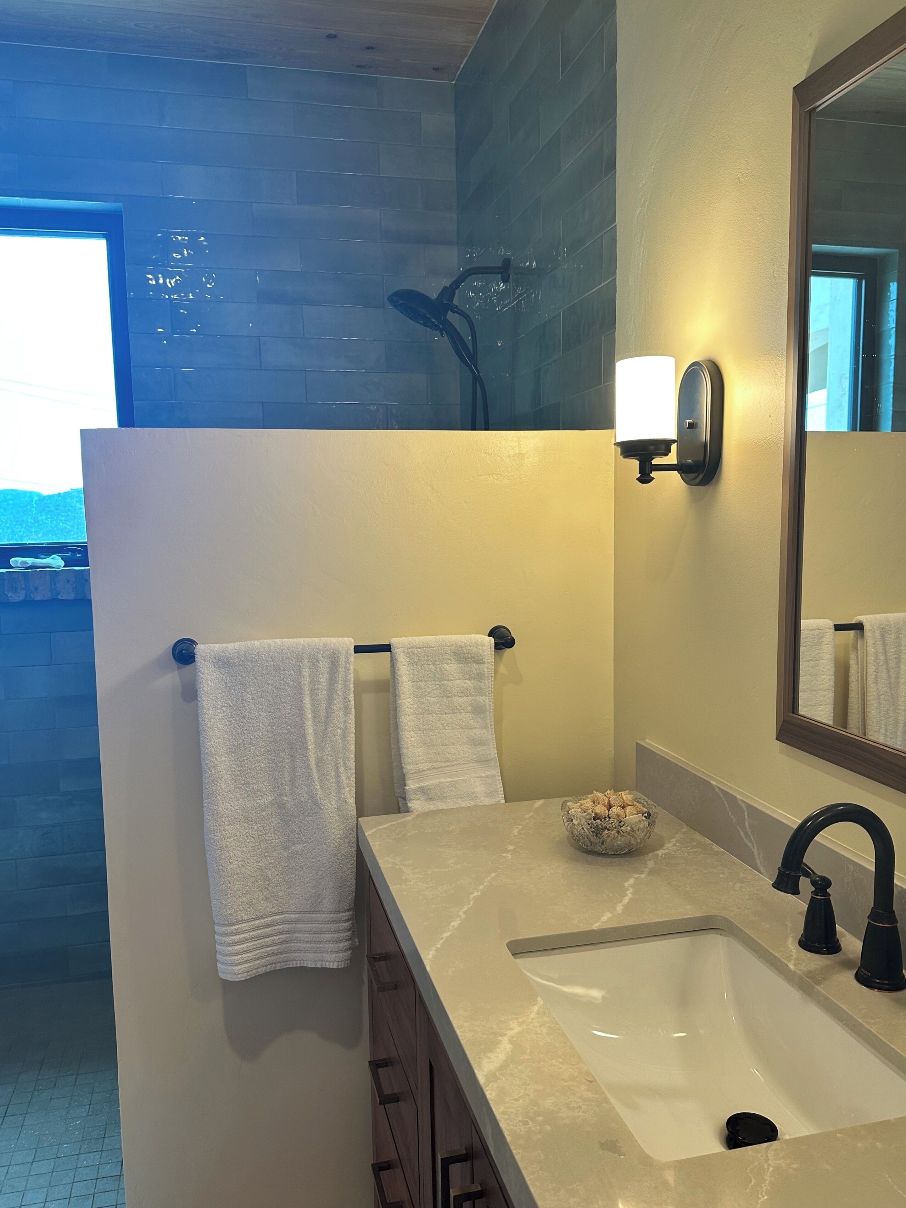 Shower, hair dryer, towels, soap