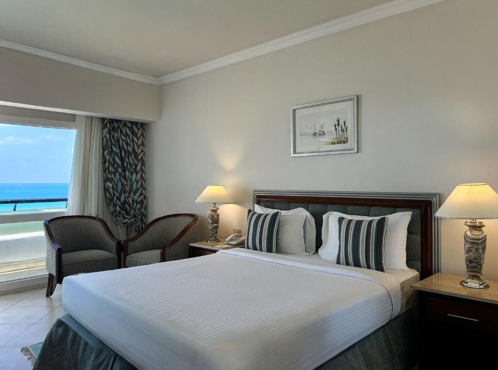 Chambre Double, balcon, vue mer | Coffres-forts dans les chambres, Wi-Fi gratuit