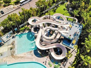 A water park with multiple slides and a swimming pool. - Vibrant Vista Stay, Short Stroll To Downtown (Vista)