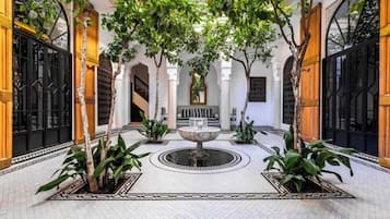 Junior Double Room, Patio | Property grounds