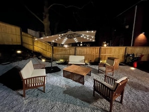 Property grounds - Experience Portland’s charm in this beautifully restored 2-bed, 1.5-bath Victorian apartment! Located downtown, enjoy modern comforts, historic elegance, a private backyard, AC, and 1 free parking spot. Perfect for your Maine getaway! 🦞 (Portland)