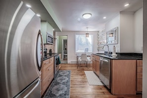 Coffee/tea maker, fridge, microwave, oven - Experience Portland’s charm in this beautifully restored 2-bed, 1.5-bath Victorian apartment! Located downtown, enjoy modern comforts, historic elegance, a private backyard, AC, and 1 free parking spot. Perfect for your Maine getaway! 🦞 (Portland)
