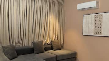 Departamento, 1 habitación, balcón | Área de sala de estar