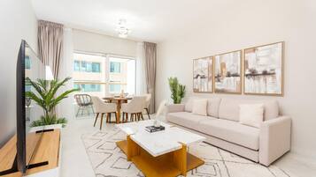 Comfort Apartment, 2 Bedrooms, Kitchen, Bay View | Living area | 55-inch Smart TV with satellite channels, Netflix, Hulu