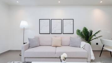 Panoramic Apartment, 2 Bedrooms, Ocean View | Living area | 55-inch Smart TV with satellite channels, Netflix, Hulu