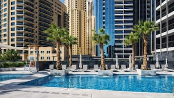 2 outdoor pools, open 8:00 AM to 10:00 PM, pool umbrellas, pool loungers