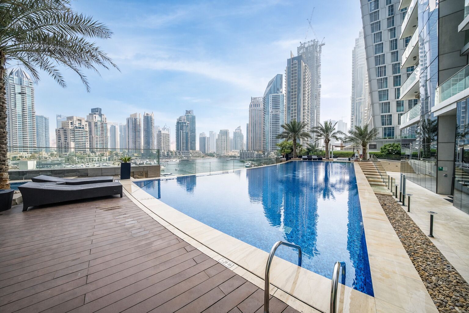 2 outdoor pools, open 8:00 AM to 10:00 PM, pool umbrellas, pool loungers
