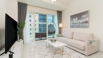 Luxury Apartment, 1 Bedroom, Sea View | Living area | 55-inch Smart TV with satellite channels, Netflix, Hulu