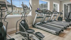 A gym with treadmills, ellipticals, and a rowing machine. - New St. Augustine Getaway Near Beaches, Golf & Downtown Adventures (St. Augustine)