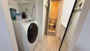 Hair dryer, towels, soap, toilet paper