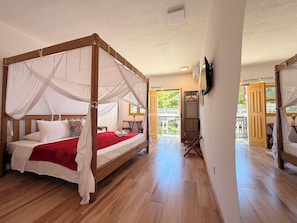 Suite Deluxe | Minibar, espacio para trabajar con laptop y wifi gratis 