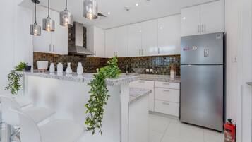 Family Apartment, 2 Bedrooms, Canal View | Private kitchen | Full-sized fridge, oven, stovetop, cookware/dishes/utensils