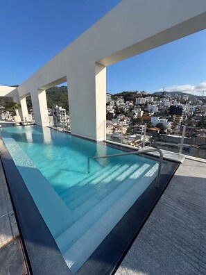 Outdoor pool - Luxury Penthouse w/ Ocean View • Walk to Beach + Malecón (Puerto Vallarta)