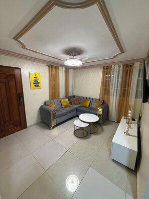 Living area - Close to everything and very cozy home, definitely feel home away from home (Santiago de los Caballeros)