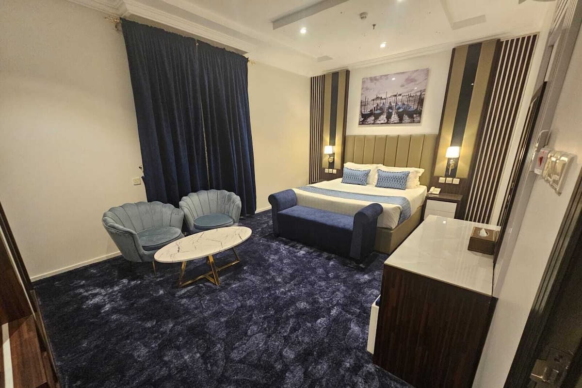 Luxury Suite | Egyptian cotton sheets, premium bedding, soundproofing