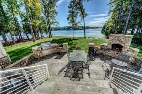 Outdoor dining. Luxury Private Waterfront Home on Private Side, Lake Anna