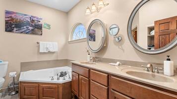 Shower, hair dryer, towels, shampoo