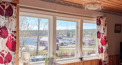 Cozy house with lake view in pleasant fishing village.