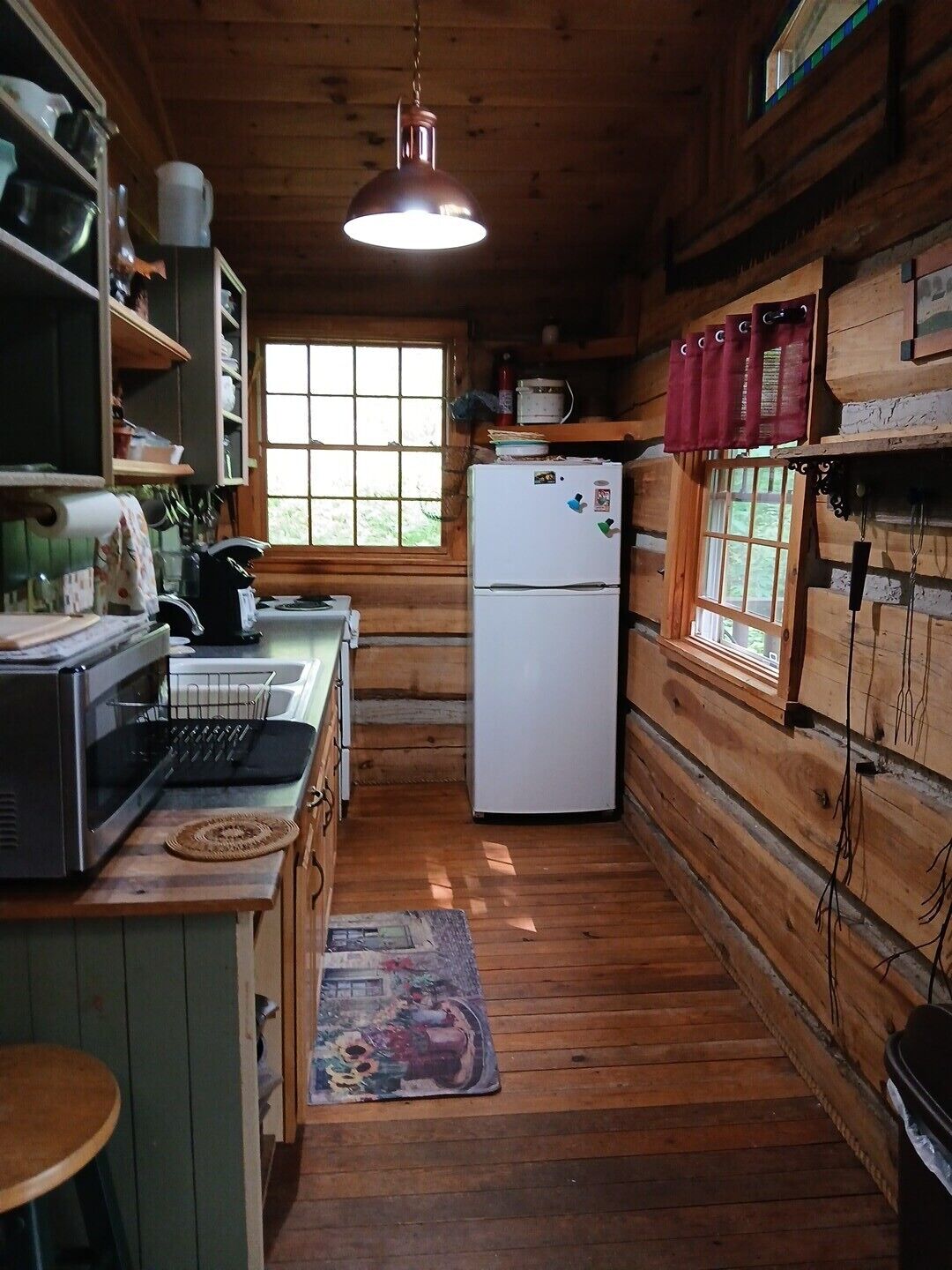 Coffee/tea maker, cookware/dishes/utensils, lobster pot, paper towels