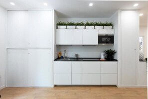 Chambre Double Deluxe, vue ville | Cuisine privée