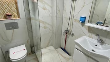 Standard Condo, Balcony, Garden View | Bathroom | Shower, hair dryer, towels, soap