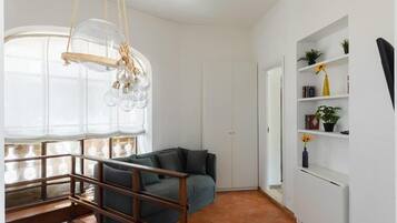 Appartamento Deluxe, balcone | Area soggiorno