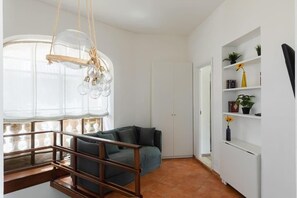 Appartamento Deluxe, balcone | Area soggiorno