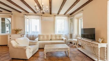 Comfort Apartment, 1 Queen Bed with Sofa bed, Private Bathroom, City View | Living area | 48-inch Smart TV with satellite channels, Netflix, streaming services