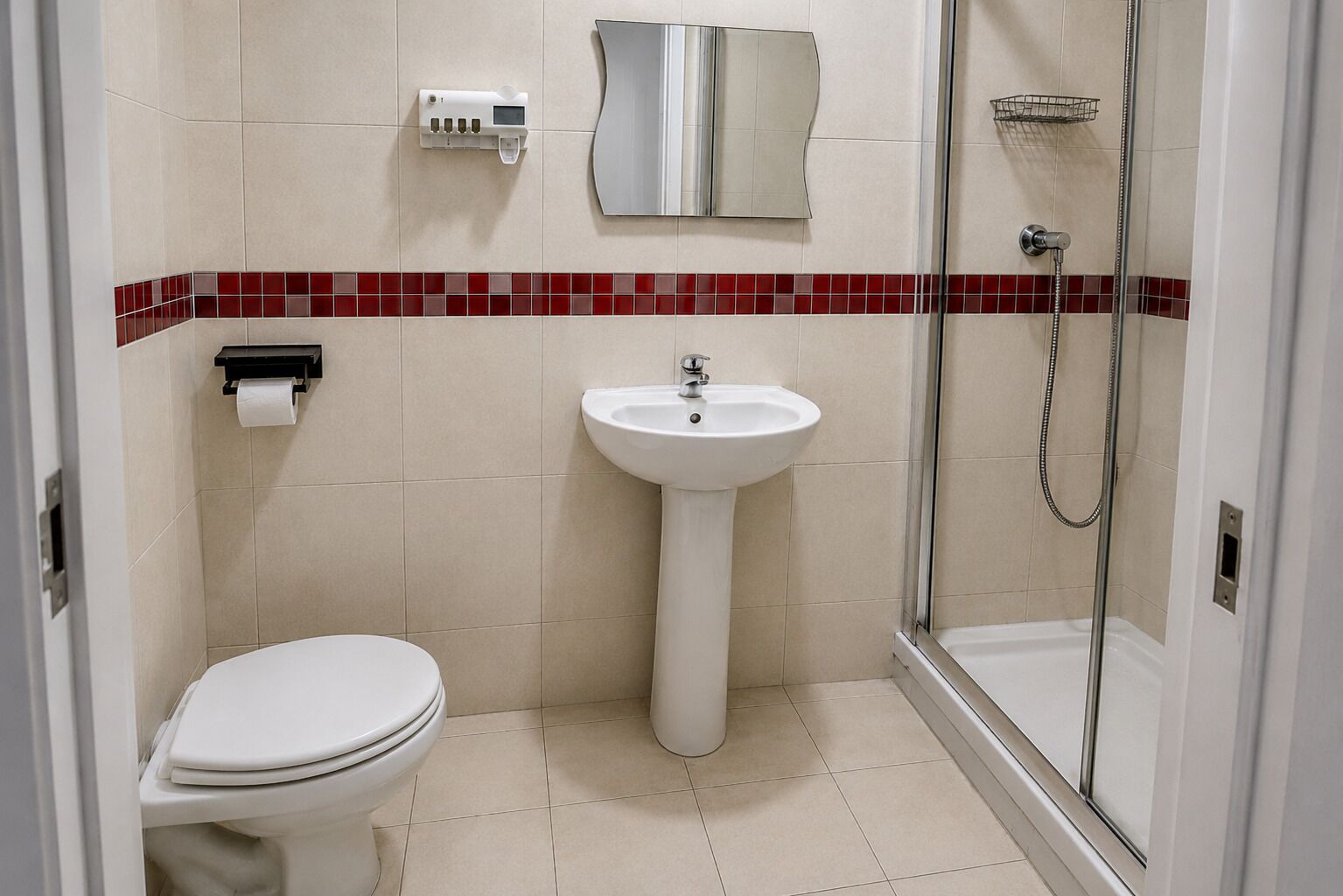 Shower, towels, soap, toilet paper