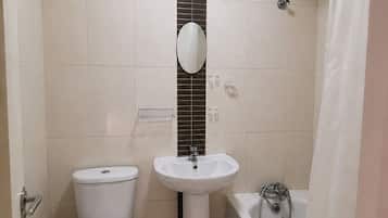 Shower, towels, soap, toilet paper