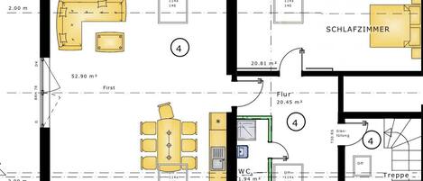 Un plan d’étage comprenant un espace de vie, une salle à manger, une salle de bain et une chambre.