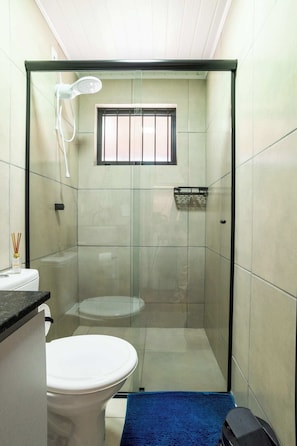 Bidet, towels, soap, toilet paper
