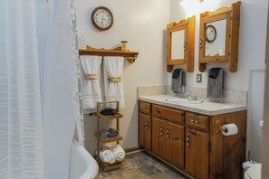 Bidet, towels, soap, toilet paper