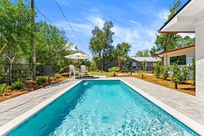 Outdoor pool, a heated pool - NEW! LUX Coastal Oasis w/Private Pool and Putt-Putt (Mexico Beach)