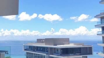 Deluxe Studio, Balcony, Beach View | Property grounds