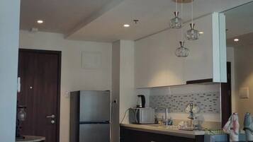 Deluxe Studio, Balcony, Beach View | Private kitchen | Electric kettle
