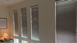 A bedroom with a bed, a nightstand, a lamp, and large windows with blinds. - 3Bed Sports Fan Oasis. 5 mins Astros, 10 mins NRG. (Houston)