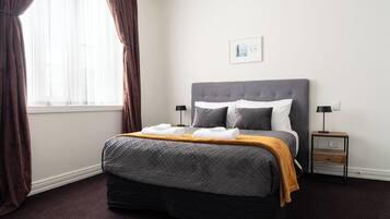 Apartamento | Cortinas opacas, tabla de planchar con plancha, wifi gratis