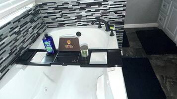 Jetted tub, hair dryer, towels, soap