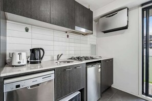 Fridge, microwave, stovetop, dishwasher - Couples Studio | Steps to Hospital & Medical Institute (Box Hill)