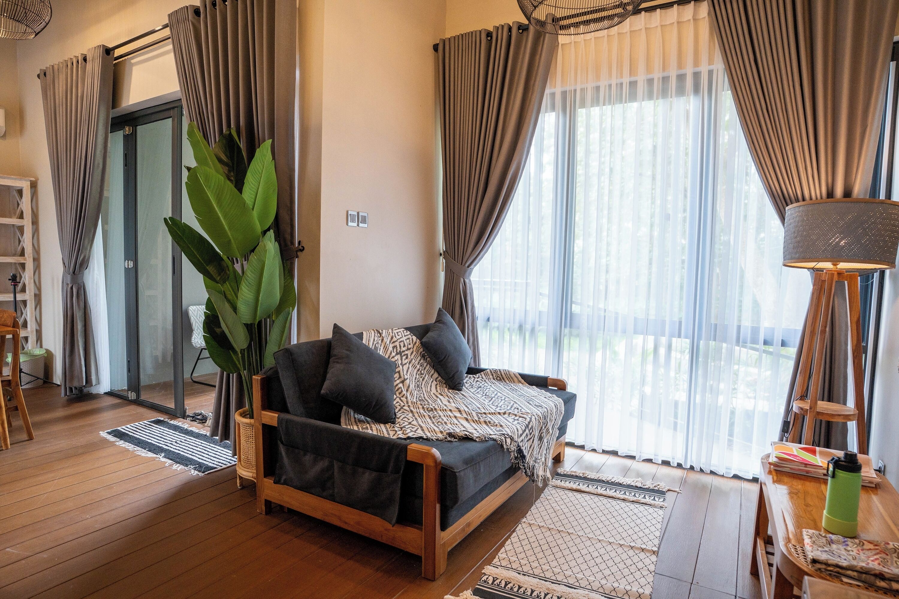 Desk, iron/ironing board, bed sheets
