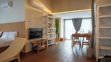 Desk, iron/ironing board, bed sheets